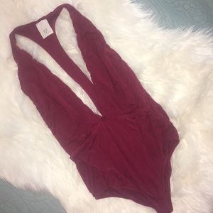 Plunge body suit